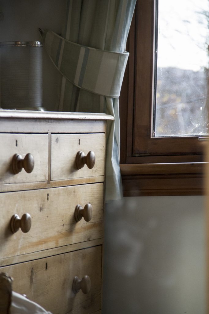 close up shot of wooden chest of drawers